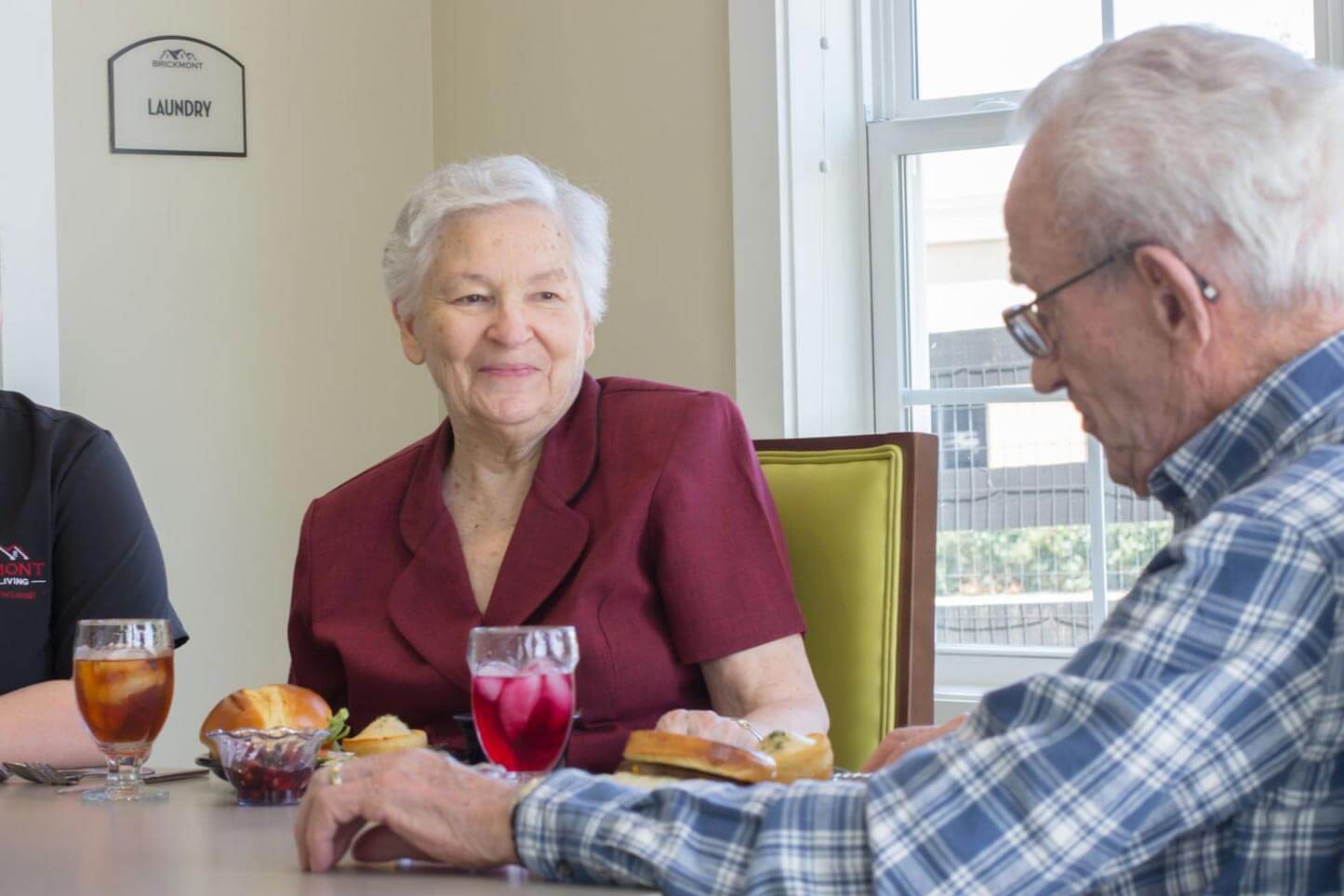Memory Care residents dining together